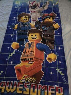 Lego towel with blue and yellow accents